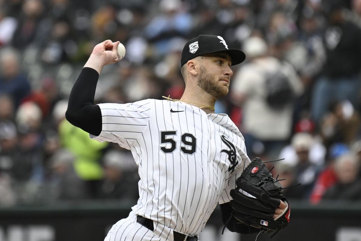 Mar 27, 2025; Chicago, Illinois, USA;  Chicago White Sox pitcher Sean Burke (59) delivers against the Los Angeles Angels during the first inning at Guaranteed Rate Field. Mandatory Credit: Matt Marton-Imagn Images