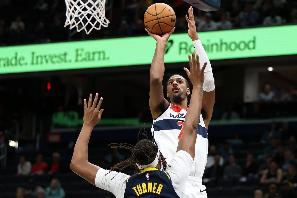 Mar 27, 2025; Washington, District of Columbia, USA; Washington Wizards forward Alex Sarr (20) takes a shot over Indiana Pacers center Myles Turner (33) during the first half at Capital One Arena. Mandatory Credit: Daniel Kucin Jr.-Imagn Images