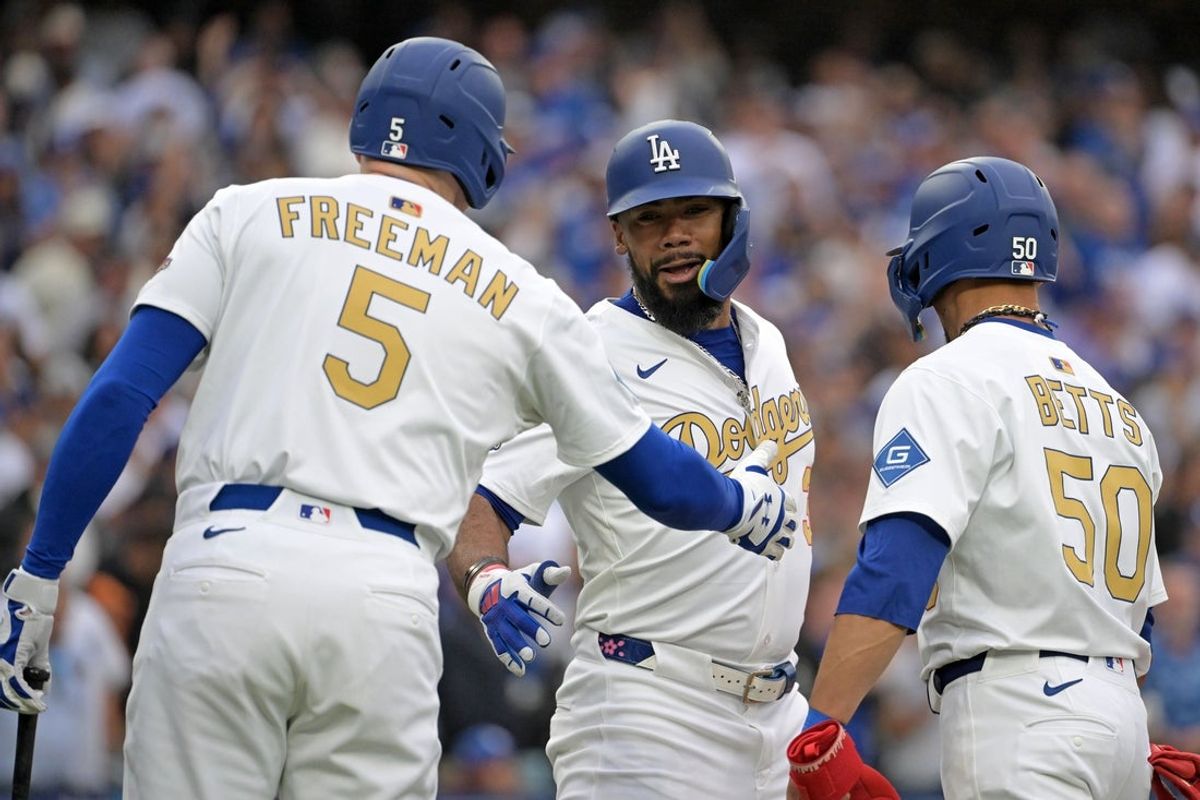 Mar 27, 2025; Los Angeles, California, USA; Los Angeles Dodgers outfielder Teoscar Hernandez (37) reacts with shortstop Mookie Betts (50) and first base Freddie Freeman (5) after hitting a three run home run against the Detroit Tigers during the fifth inning at Dodger Stadium. Mandatory Credit: Jayne Kamin-Oncea-Imagn Images