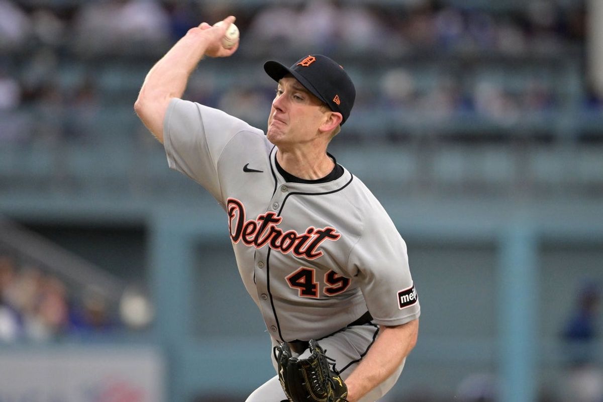 Mar 27, 2025; Los Angeles, California, USA; Detroit Tigers pitcher John Brebbia (49) throws a pitch against the Los Angeles Dodgers during the sixth inning at Dodger Stadium. Mandatory Credit: Jayne Kamin-Oncea-Imagn Images