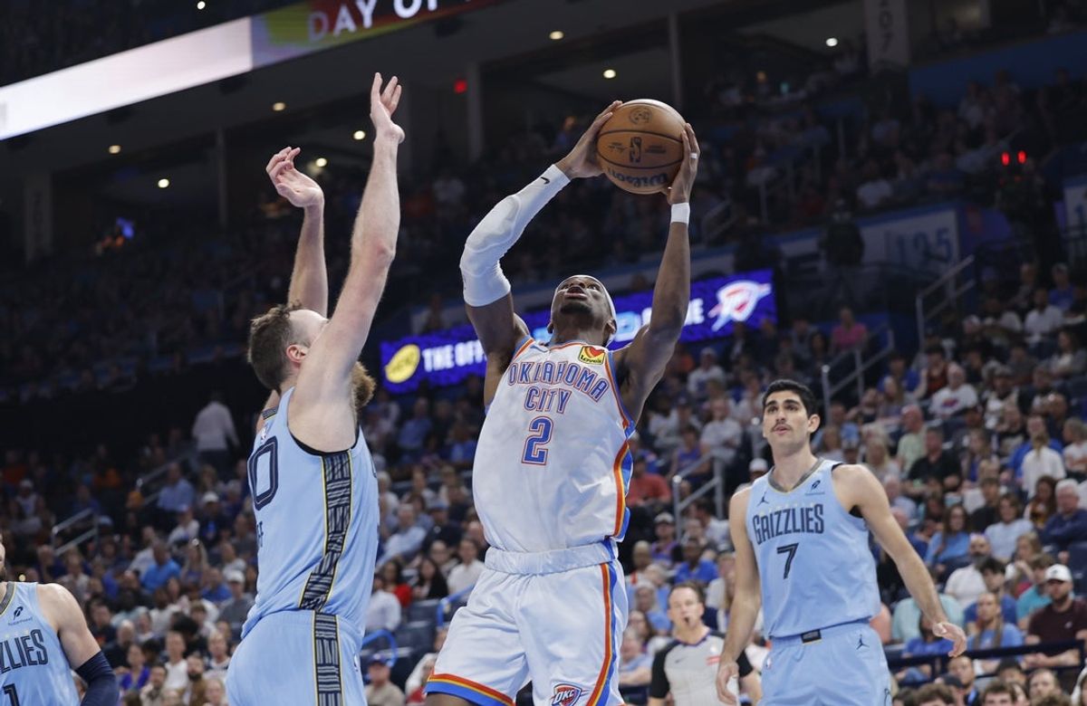 Mar 27, 2025; Oklahoma City, Oklahoma, USA; Oklahoma City Thunder guard Shai Gilgeous-Alexander (2) shoots against Memphis Grizzlies center Jay Huff (30) during the second quarter at Paycom Center. Mandatory Credit: Alonzo Adams-Imagn Images
