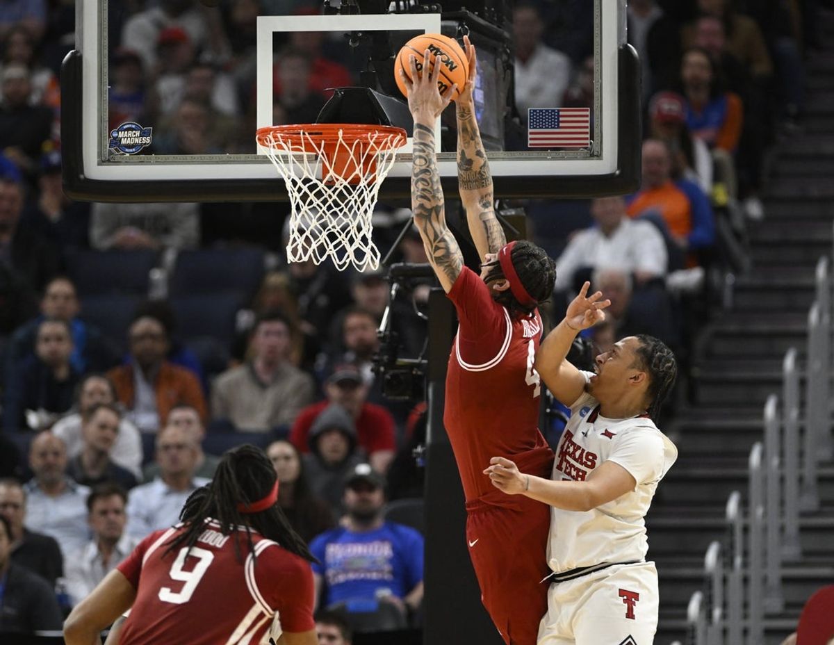 Mar 27, 2025; San Francisco, CA, USA; Arkansas Razorbacks forward Trevon Brazile (4) dunks over Texas Tech Red Raiders forward Darrion Williams (5) during the second half during a West Regional semifinal of the 2025 NCAA tournament at Chase Center. Mandatory Credit: Eakin Howard-Imagn Images