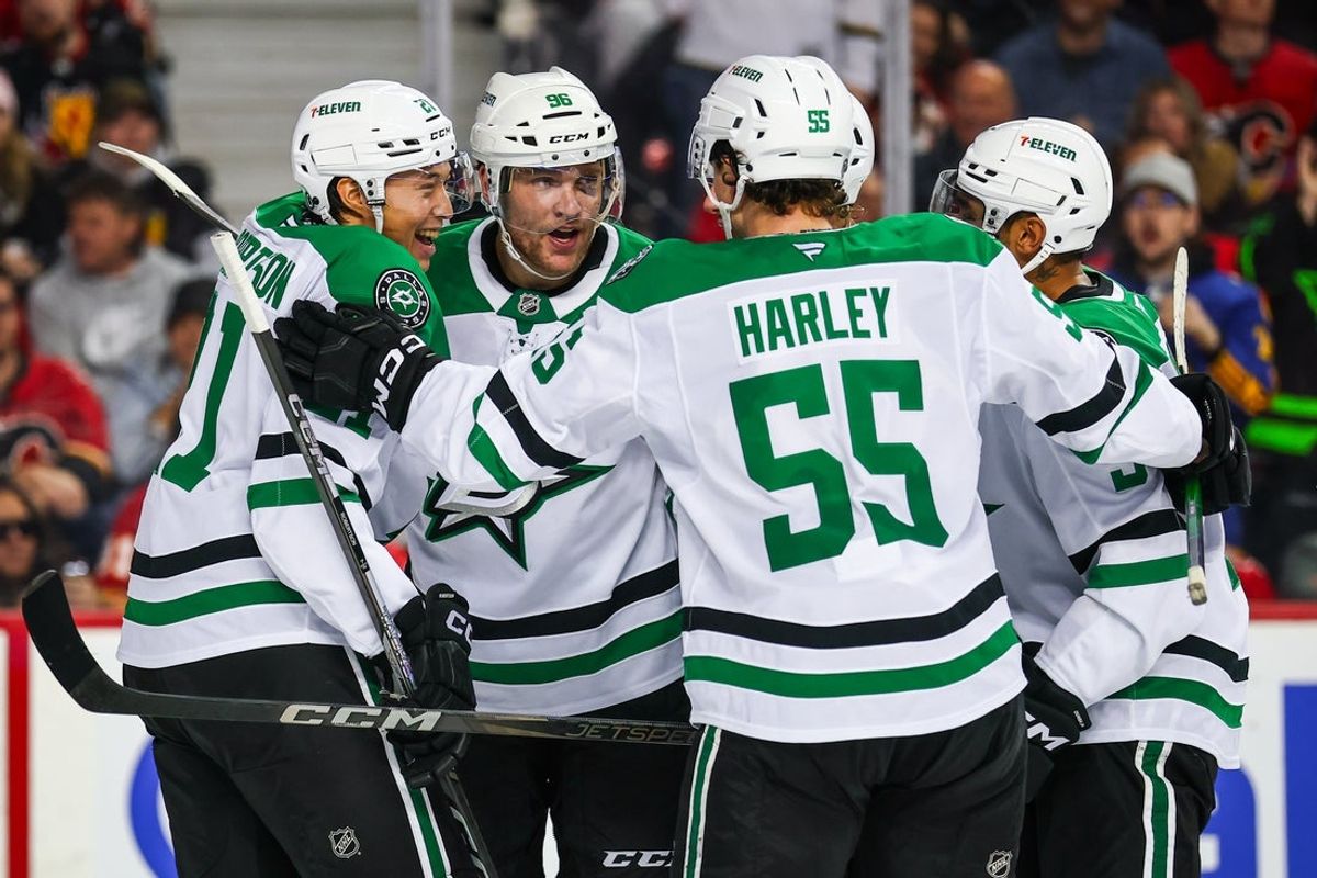 Mar 27, 2025; Calgary, Alberta, CAN; Dallas Stars right wing Mikko Rantanen (96) celebrates his goal with teammates against the Calgary Flames during the third period at Scotiabank Saddledome. Mandatory Credit: Sergei Belski-Imagn Images