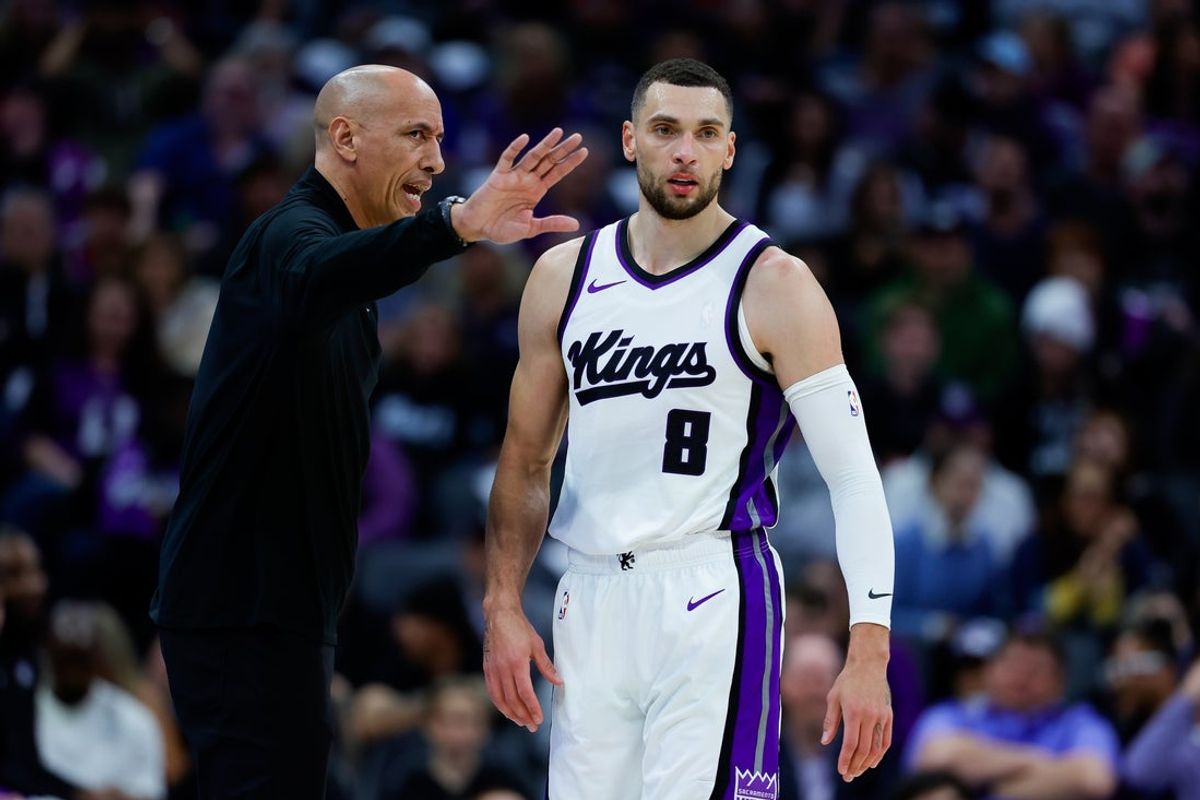 Mar 27, 2025; Sacramento, California, USA; Sacramento Kings interim head coach Doug Christie talks to guard Zach LaVine (8) during the fourth quarter against the Portland Trail Blazers at Golden 1 Center. Mandatory Credit: Sergio Estrada-Imagn Images