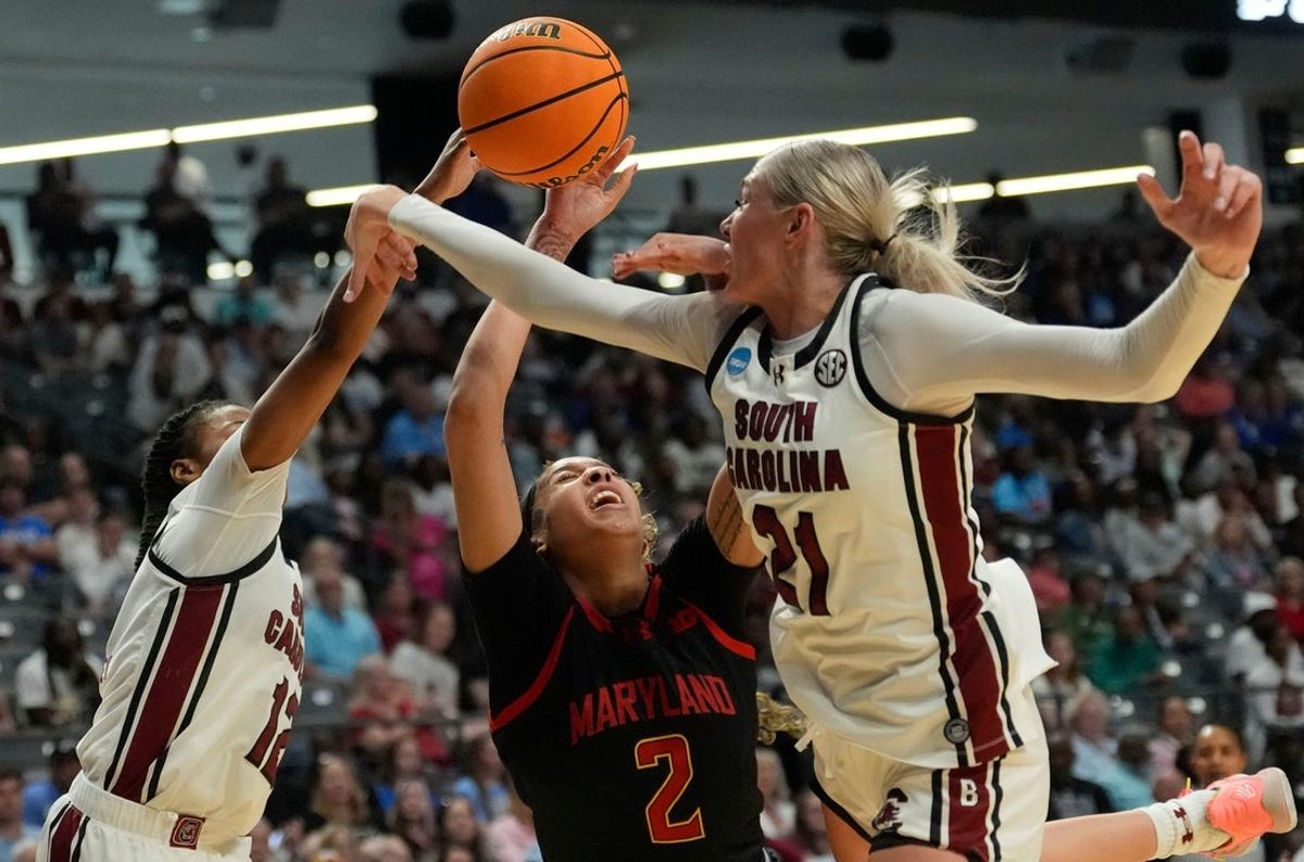Mar 28, 2025; Birmingham, AL, USA; South Carolina Gamecocks guard MiLaysia Fulwiley (12) and South Carolina Gamecocks forward Chloe Kitts (21) defend a shot in the lane by Maryland Terrapins guard Kaylene Smikle (2) at Legacy Arena in the Sweet 16. Mandatory Credit: Gary Cosby Jr.-Tuscaloosa News