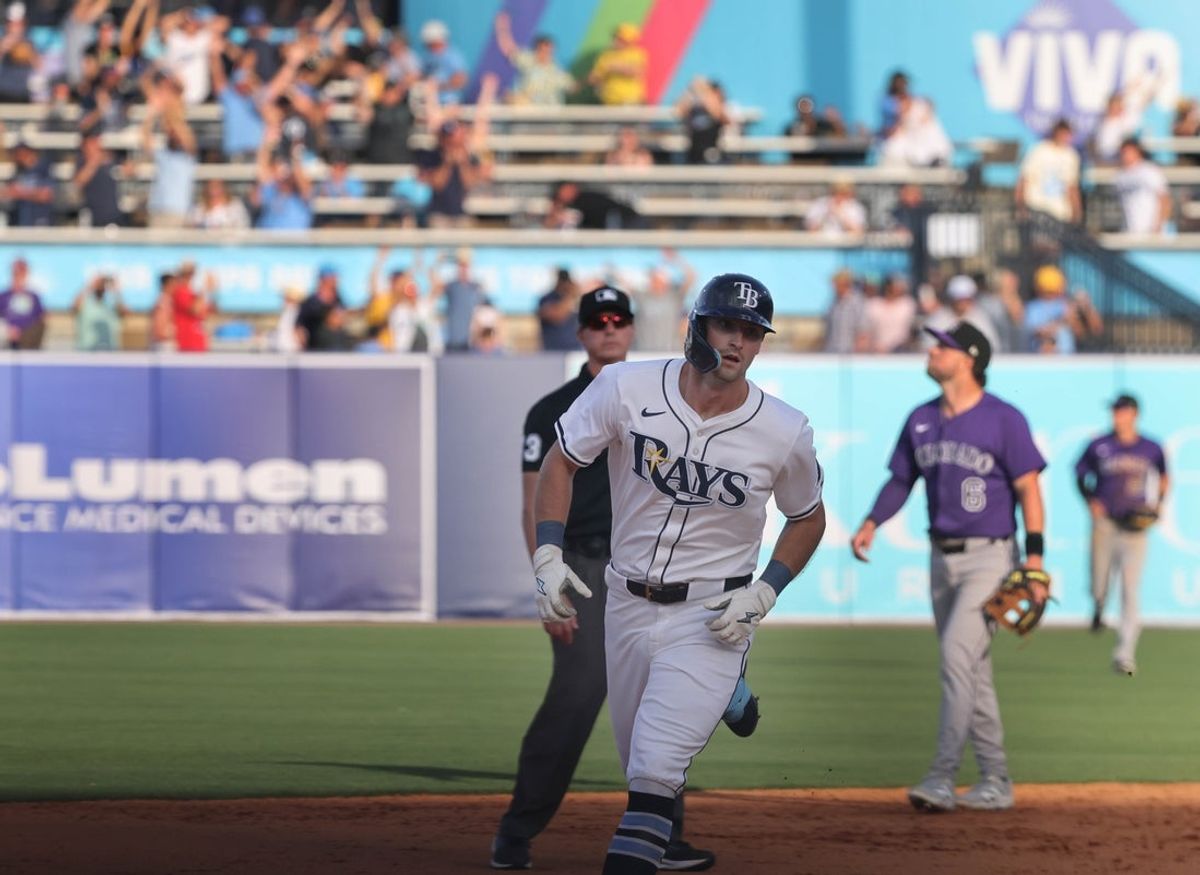 Mar 28, 2025; Tampa, Florida, USA; Tampa Bay Rays Kameron Misner (26) runs around the bases after he hits a walk-off home run to beat the Colorado Rockies during the ninth inning at George M. Steinbrenner Field. Mandatory Credit: Kim Klement Neitzel-Imagn Images