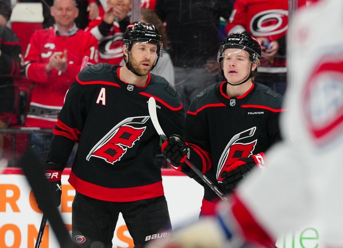 Mar 28, 2025; Raleigh, North Carolina, USA; Carolina Hurricanes right wing Jackson Blake (53) celebrates his goal with defenseman Jaccob Slavin (74) against the Montreal Canadiens during the first period at Lenovo Center. Mandatory Credit: James Guillory-Imagn Images