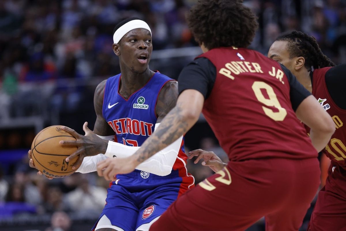 Mar 28, 2025; Detroit, Michigan, USA;  Detroit Pistons guard Dennis Schroder (17) dribbles defended by Cleveland Cavaliers guard Craig Porter Jr. (9) in the first half at Little Caesars Arena. Mandatory Credit: Rick Osentoski-Imagn Images