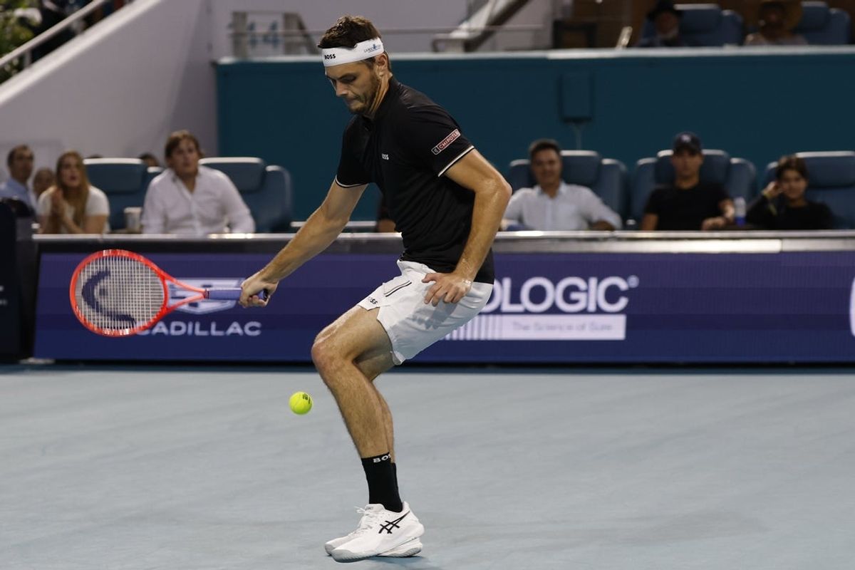 Mar 28, 2025; Miami, FL, USA; Taylor Fritz (USA) hits a tweener against Jakub Mensik (CZE)(not pictured) in a men's singles semifinal on day eleven of the Miami Open at Hard Rock Stadium. Mandatory Credit: Geoff Burke-Imagn Images