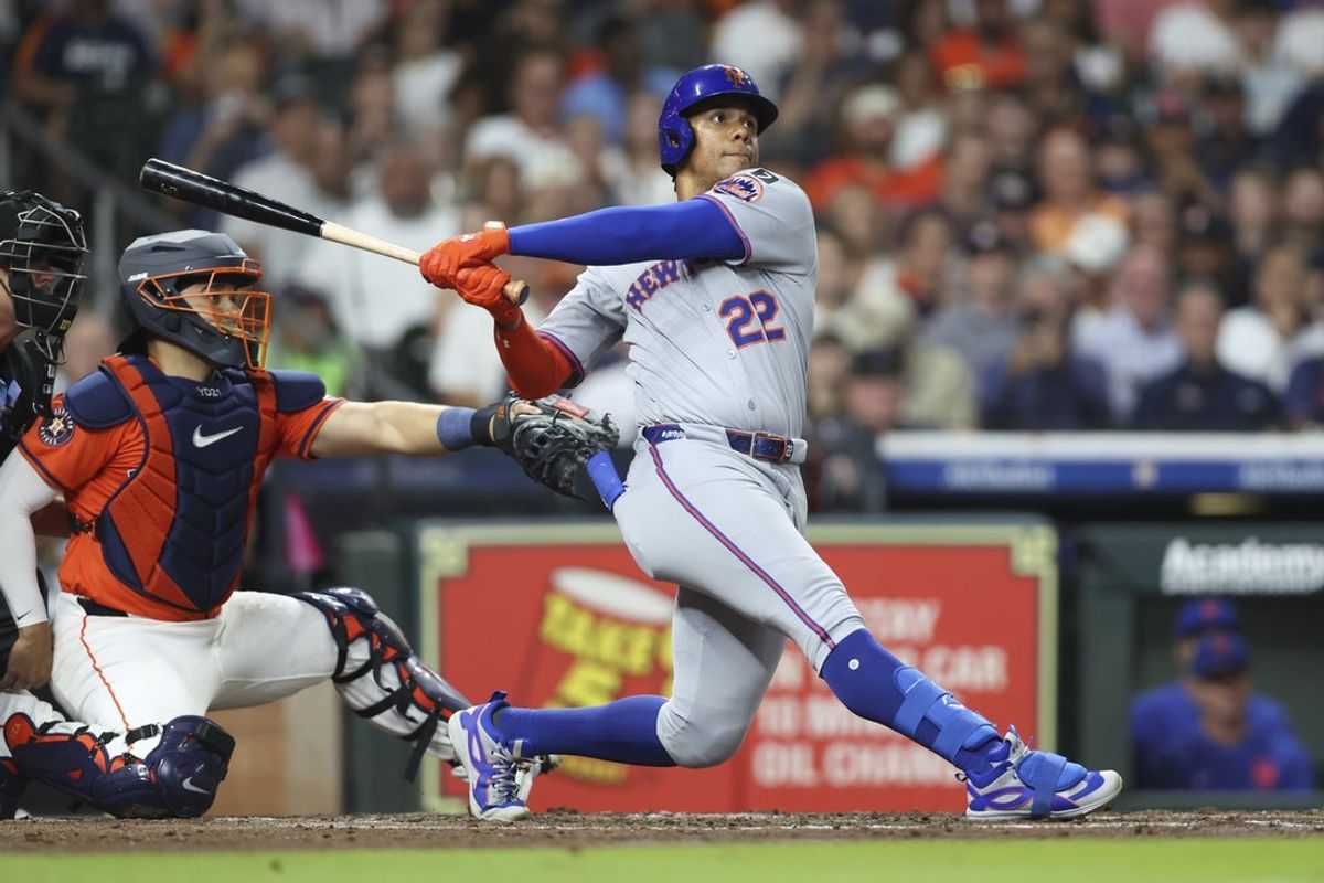 Mar 28, 2025; Houston, TX, USA; New York Mets right fielder Juan Soto (22) hits a home run during the third inning against the Houston Astros at Daikin Park. Mandatory Credit: Troy Taormina-Imagn Images