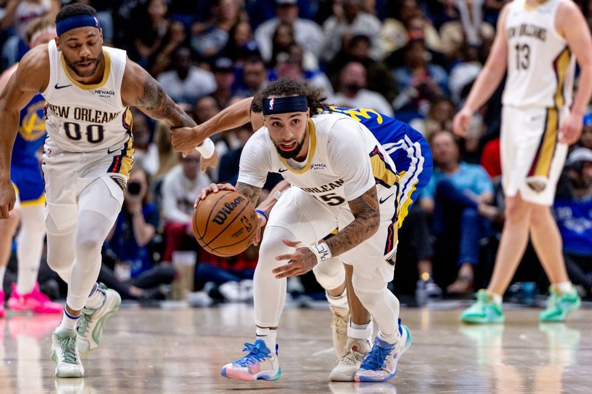 Mar 28, 2025; New Orleans, Louisiana, USA;  New Orleans Pelicans guard Jose Alvarado (15) steals the ball from Golden State Warriors guard Stephen Curry (30) during the first half at Smoothie King Center. Mandatory Credit: Stephen Lew-Imagn Images