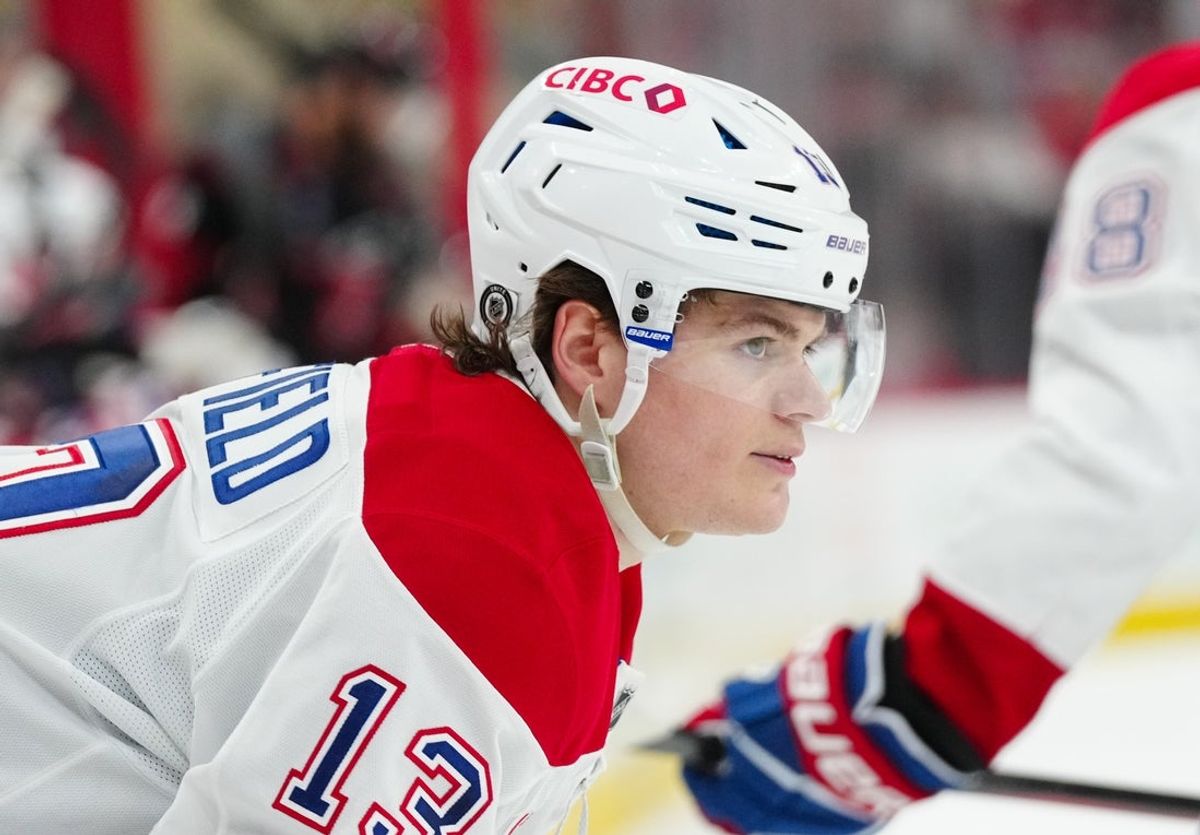 Mar 28, 2025; Raleigh, North Carolina, USA;  Montreal Canadiens right wing Cole Caufield (13) looks on against the Carolina Hurricanes during the second period at Lenovo Center. Mandatory Credit: James Guillory-Imagn Images