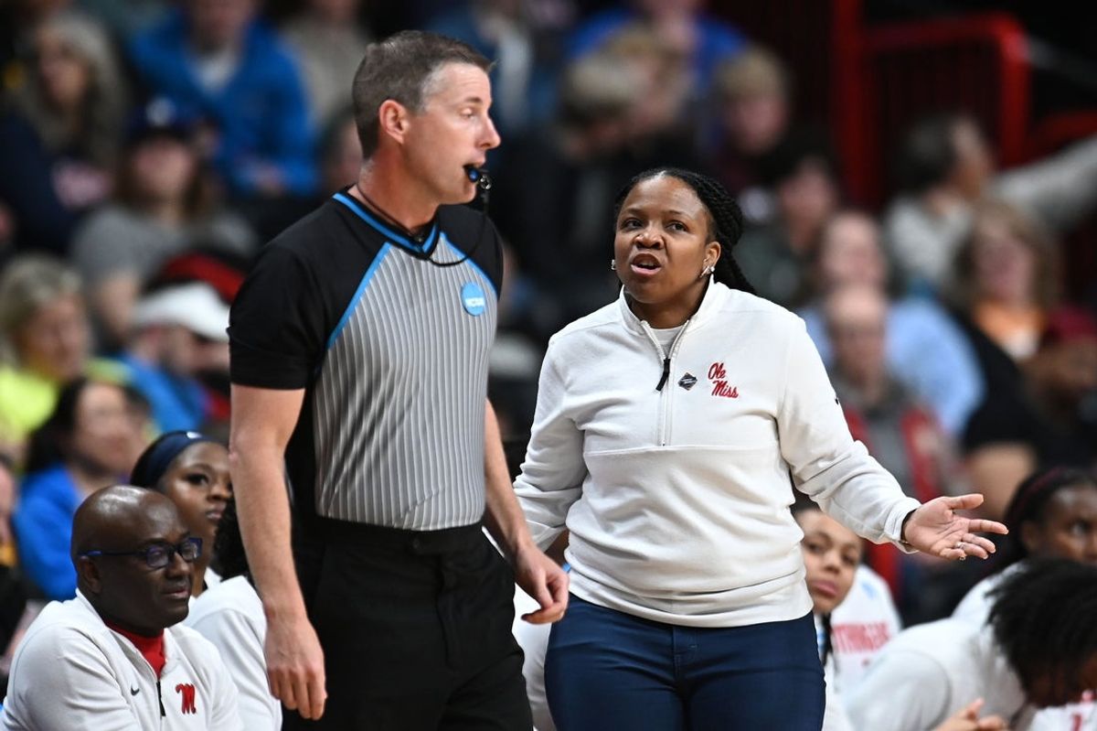 Mar 28, 2025; Spokane, WA, USA; Ole Miss Rebels head coach Yolett McPhee-McCuin talks with an official during the first half of a Sweet 16 NCAA Tournament basketball game against the UCLA Bruins at Spokane Arena. at Spokane Arena. Mandatory Credit: James Snook-Imagn Images