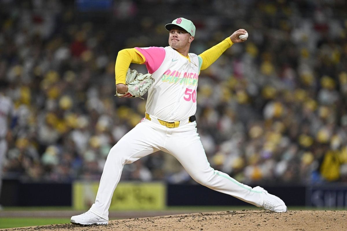 Mar 28, 2025; San Diego, California, USA; San Diego Padres relief pitcher Adrian Morejon (50) delivers during sixth inning against the Atlanta Braves at Petco Park. Mandatory Credit: Denis Poroy-Imagn Images