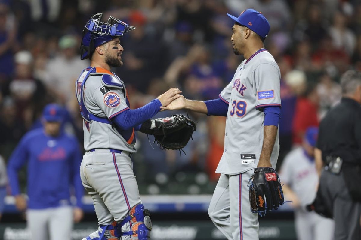 Mar 28, 2025; Houston, TX, USA; New York Mets catcher Luis Torrens (13) and relief pitcher Edwin Diaz (39) celebrate after the game against the Houston Astros at Daikin Park. Mandatory Credit: Troy Taormina-Imagn Images