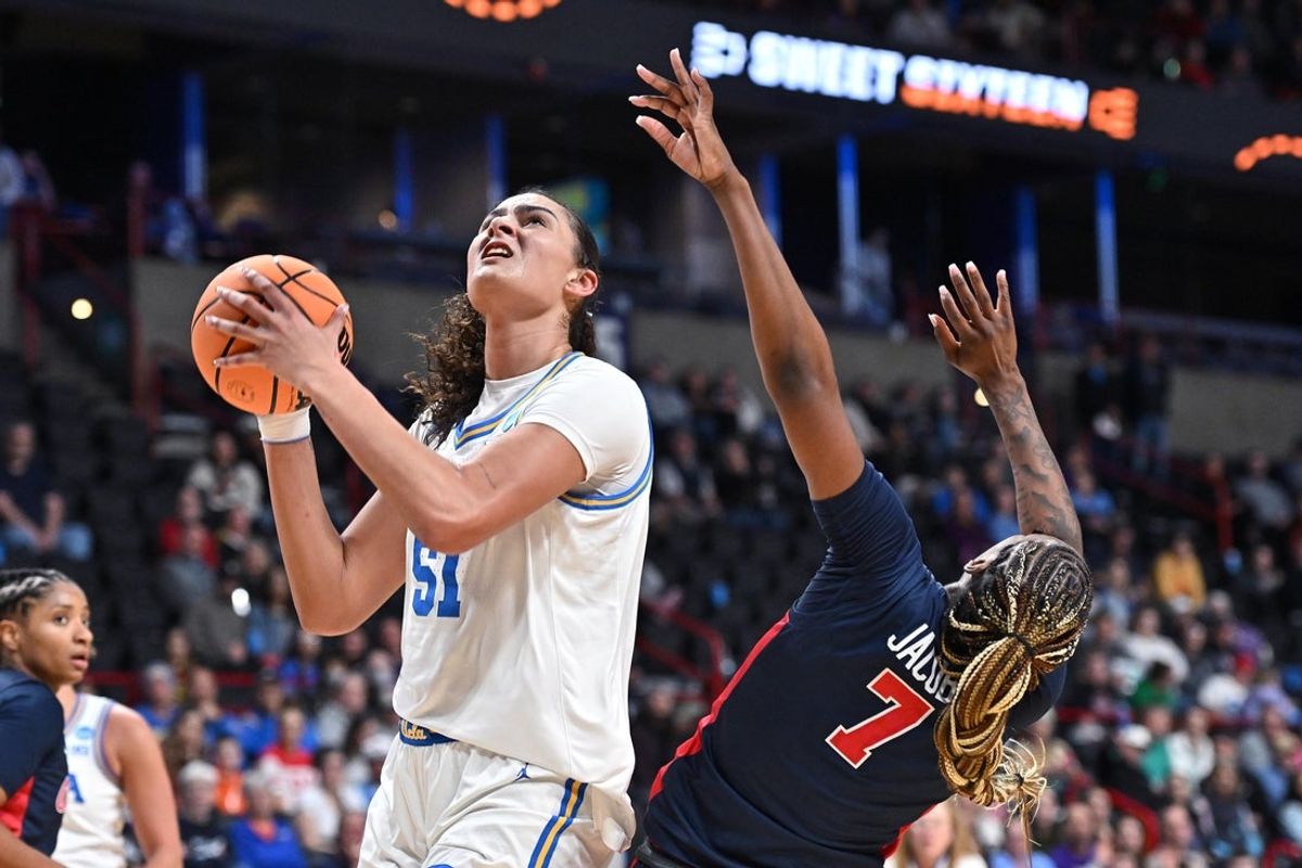 Mar 28, 2025; Spokane, WA, USA; UCLA Bruins center Lauren Betts (51) shoots against Ole Miss Rebels forward Starr Jacobs (7) during the second half of a Sweet 16 NCAA Tournament basketball game at Spokane Arena. at Spokane Arena. Mandatory Credit: James Snook-Imagn Images