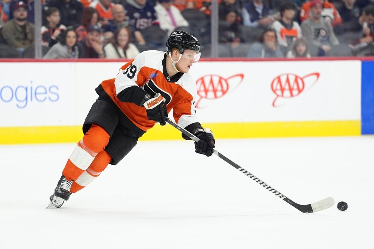 Mar 29, 2025; Philadelphia, Pennsylvania, USA; Philadelphia Flyers right wing Matvei Michkov (39) controls the puck against the Buffalo Sabres in the first period at Wells Fargo Center. Mandatory Credit: Kyle Ross-Imagn Images