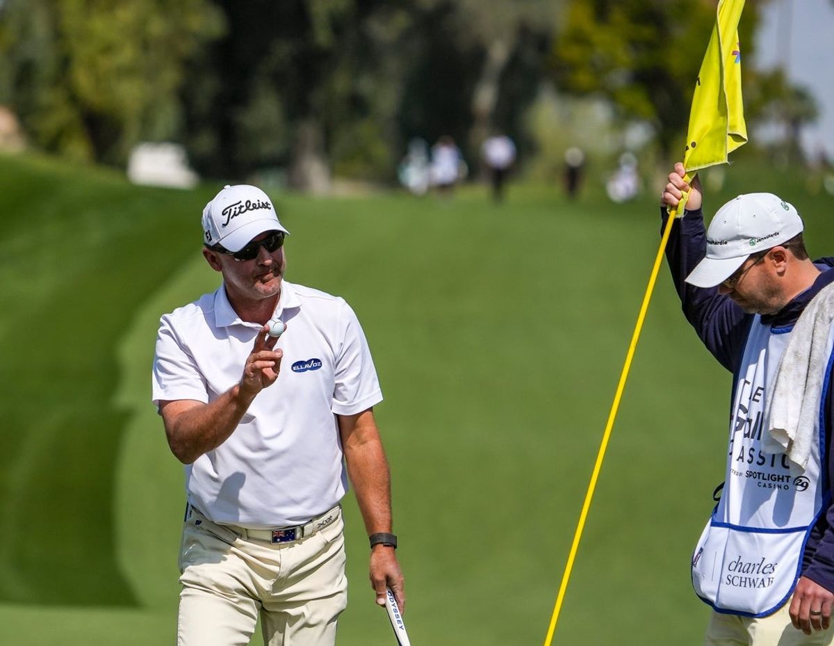 Cameron Percy gestures to spectators after a birdie putt on two during the second round of The Galleri Classic at Mission Hills Country Club in Rancho Mirage, Calif., Saturday, March 29, 2025.