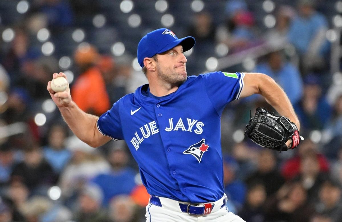 Mar 29, 2025; Toronto, Ontario, CAN; Toronto Blue Jays starting pitcher Max Scherzer (31) delivers a pitch against the Baltimore Orioles in the first inning at Rogers Centre. Mandatory Credit: Dan Hamilton-Imagn Images