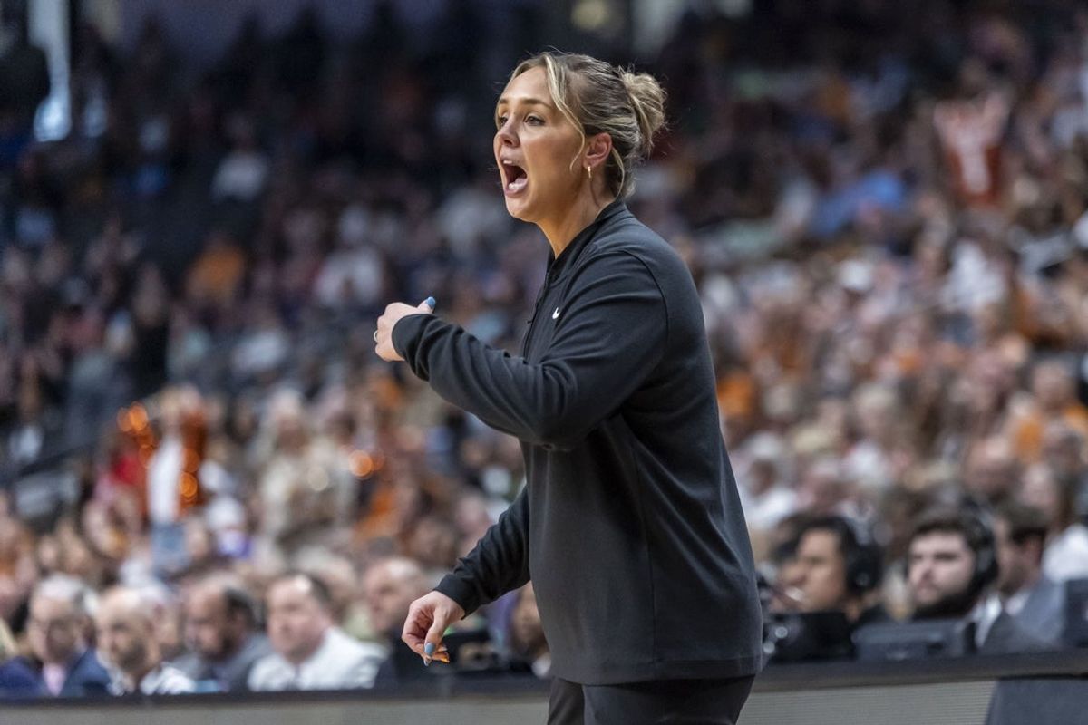 Mar 29, 2025; Birmingham, AL, USA; Tennessee Lady Vols head coach Kim Caldwell works with her team during the first half of a Sweet 16 NCAA Tournament basketball game against the Texas Longhorns at Legacy Arena. Mandatory Credit: Vasha Hunt-Imagn Images