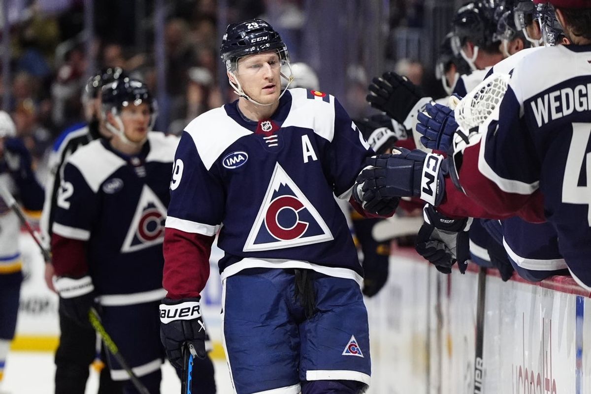 Mar 29, 2025; Denver, Colorado, USA; Colorado Avalanche center Nathan MacKinnon (29) following his goal scored in the first period against the St. Louis Blues at Ball Arena. Mandatory Credit: Ron Chenoy-Imagn Image