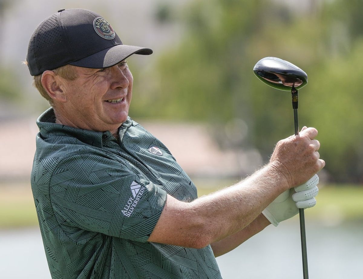 Steve Allan strangles his driver as he tries to persuade his tee shot to stay in the fairway on the 18th hole during the Galleri Classic at Mission Hills Country Club in Rancho Mirage, Calif., March 29, 2025.