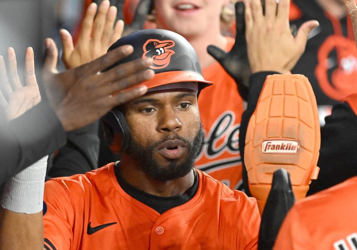 Mar 29, 2025; Toronto, Ontario, CAN;  Baltimore Orioles center fielder Cedric Mullins (31) celebrates with team mates in the dugout after scoring a run against the Toronto Blue Jays in the fourth inning at Rogers Centre. Mandatory Credit: Dan Hamilton-Imagn Images