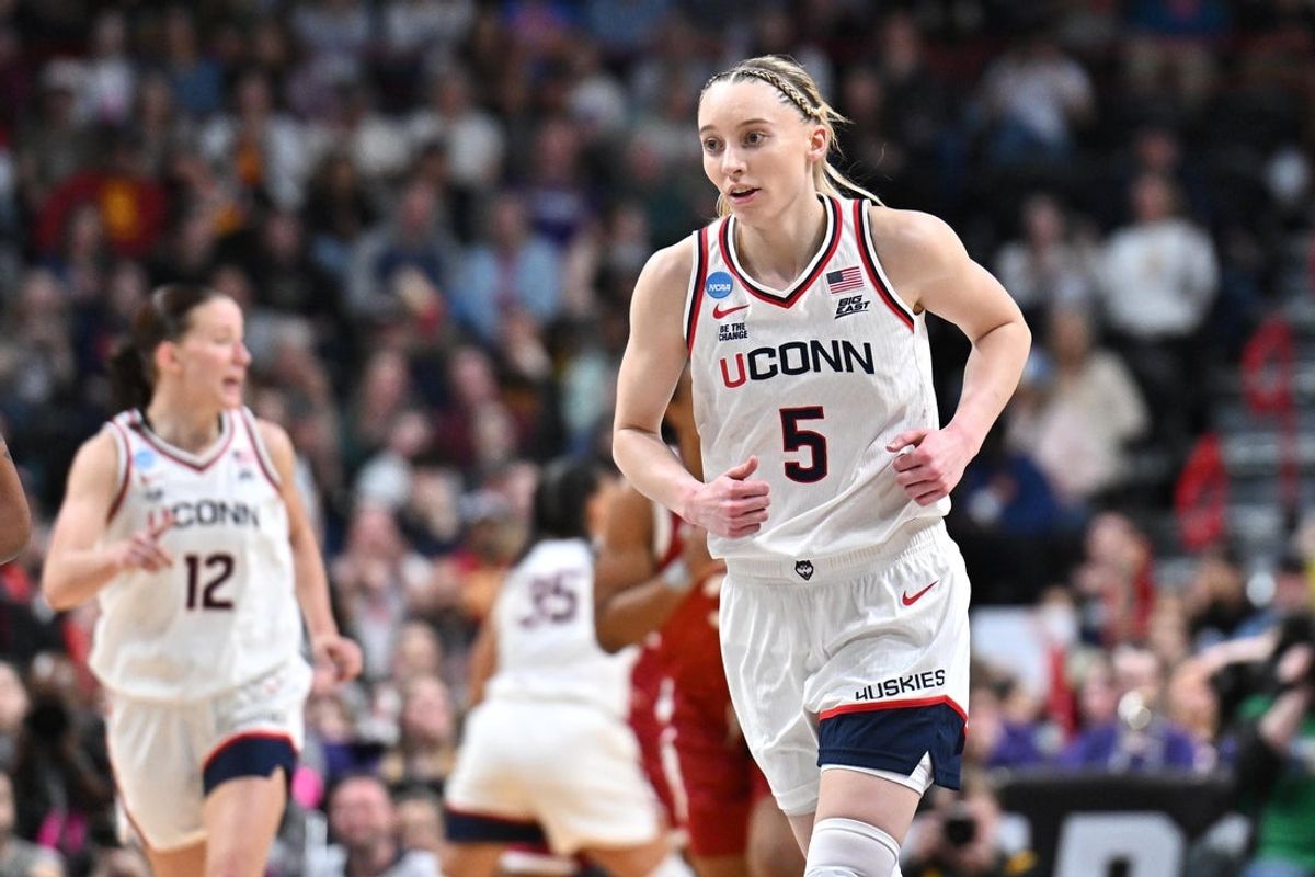 Mar 29, 2025; Spokane, WA, USA; UConn Huskies guard Paige Bueckers (5) runs back on defense against the Oklahoma Sooners during the second half of a Sweet 16 NCAA Tournament basketball game at Spokane Arena. Mandatory Credit: James Snook-Imagn Images