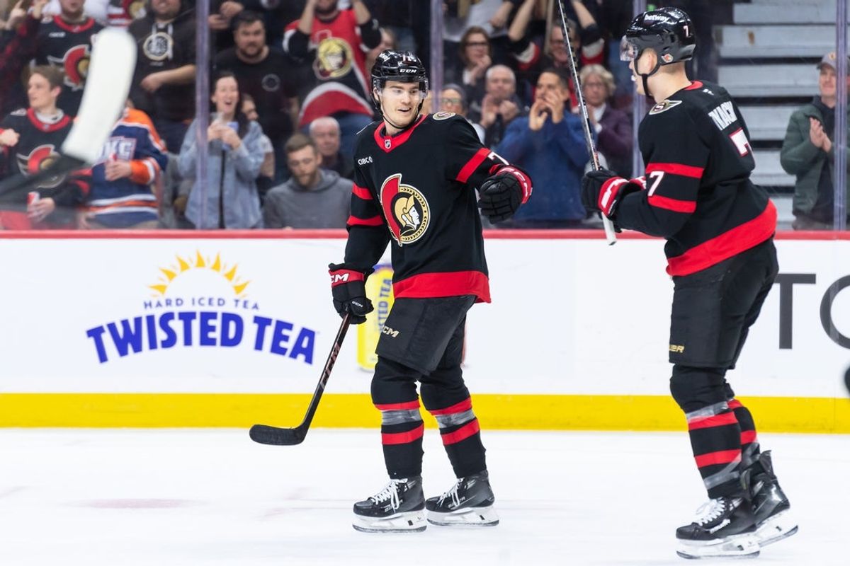Mar 29, 2025; Ottawa, Ontario, CAN; Ottawa Senators center Ridly Greig (71) celebrates with left wing Brady Tkachuk (7) his goal scored in the first period against the Columbus Blue Jackets at the Canadian Tire Centre. Mandatory Credit: Marc DesRosiers-Imagn Images