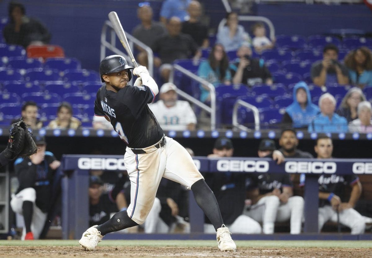 Mar 29, 2025; Miami, Florida, USA;  Miami Marlins right fielder Dane Myers (54) follows through on his RBI single against the Pittsburgh Pirates during the thirteenth inning at loanDepot Park. Mandatory Credit: Rhona Wise-Imagn Images