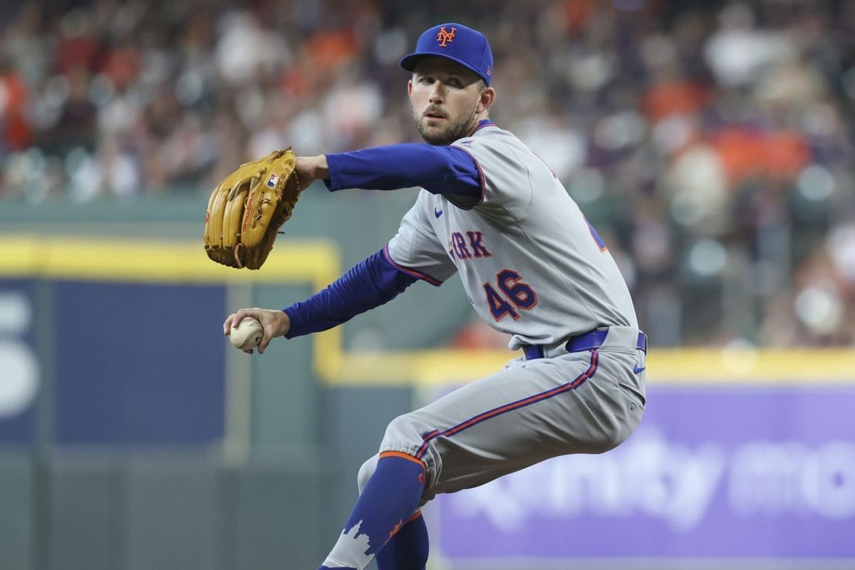 Mar 29, 2025; Houston, Texas, USA; New York Mets starting pitcher Griffin Canning (46) delivers a pitch during the second inning against the Houston Astros at Daikin Park. Mandatory Credit: Troy Taormina-Imagn Images