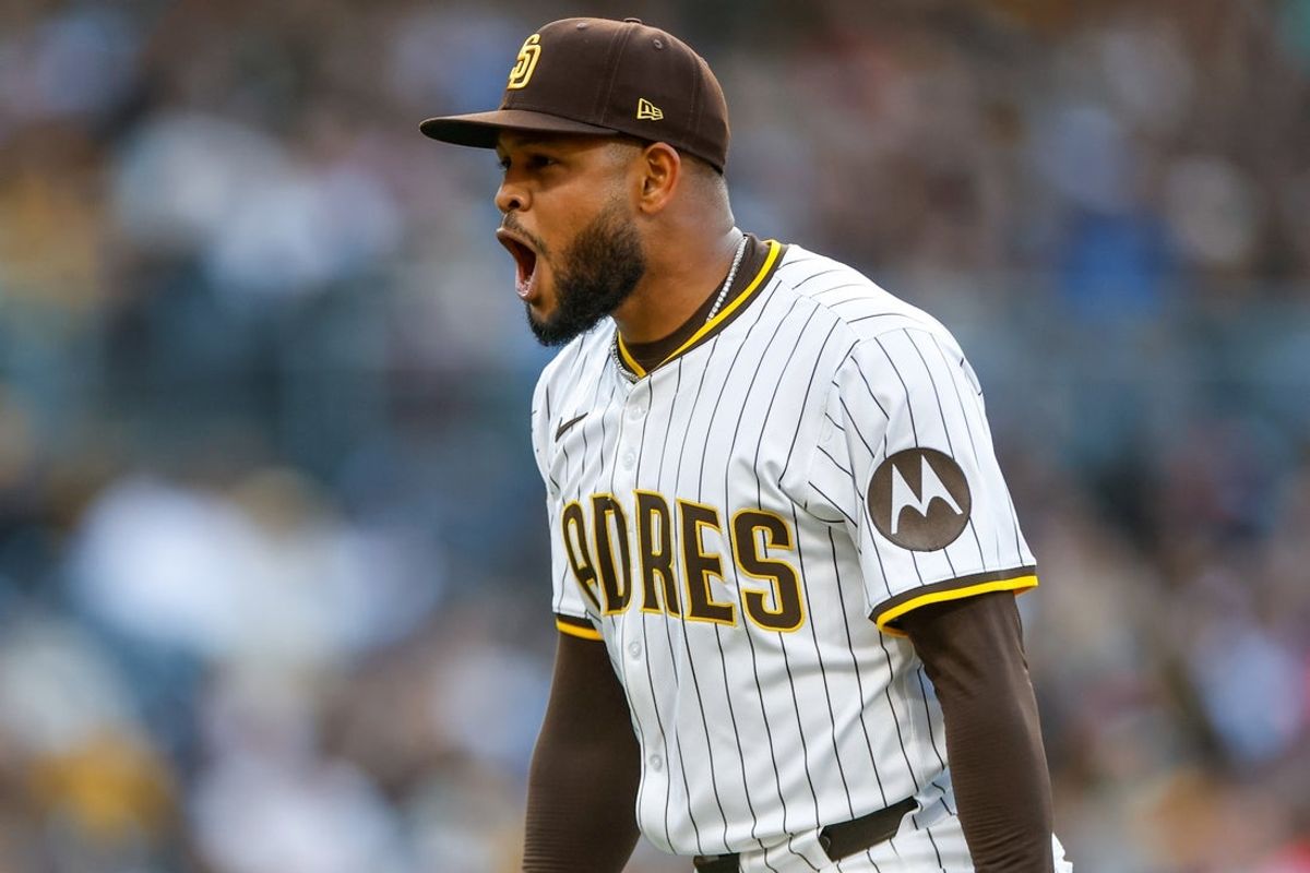 Mar 29, 2025; San Diego, California, USA; San Diego Padres starting pitcher Randy Vasquez (98) celebrates after  Atlanta Braves right fielder Jarred Kelenic (24) is caught stealing to end the top of the fifth inning at Petco Park. Mandatory Credit: David Frerker-Imagn Images