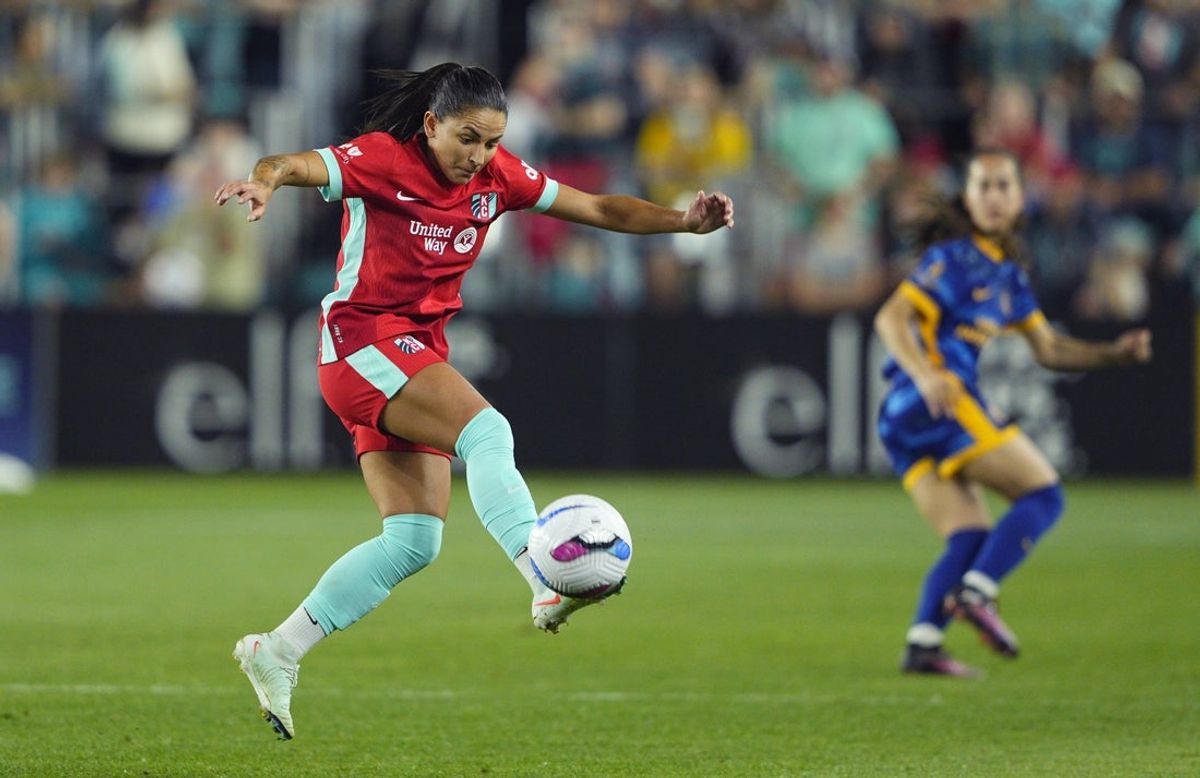 Mar 29, 2025; Kansas City, Missouri, USA; Kansas City Current midfielder Debinha (99) controls the ball during the second half against Utah Royals FC at CPKC Stadium. Mandatory Credit: Jay Biggerstaff-Imagn Images