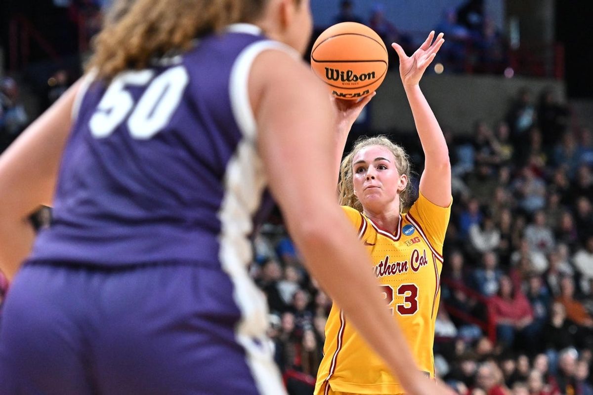 Mar 29, 2025; Spokane, WA, USA; USC Trojans guard Avery Howell (23) shoots against the Kansas State Wildcats during the second half of a Sweet 16 NCAA Tournament basketball game against the Kansas State Wildcats at Spokane Arena. Mandatory Credit: James Snook-Imagn Images