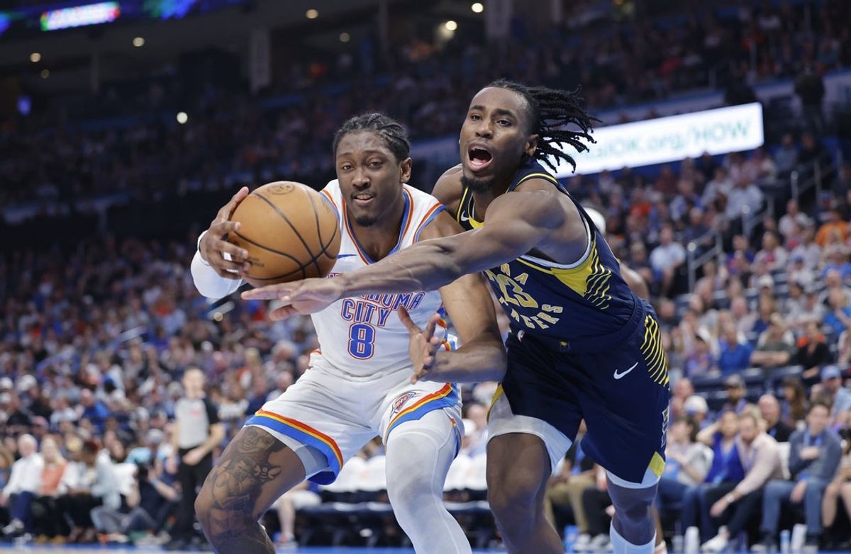Mar 29, 2025; Oklahoma City, Oklahoma, USA; Indiana Pacers forward Aaron Nesmith (23) and Oklahoma City Thunder forward Jalen Williams (8) fight for control of the ball during the second half at Paycom Center. Mandatory Credit: Alonzo Adams-Imagn Images