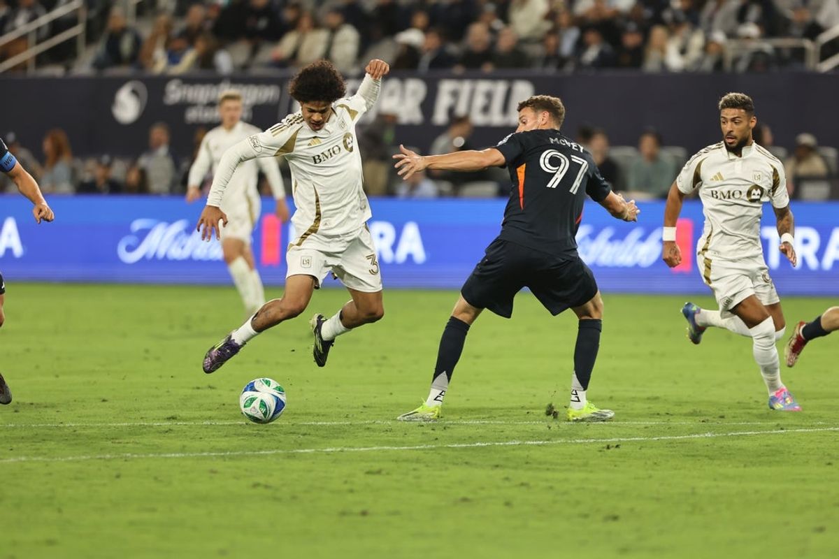Mar 29, 2025; San Diego, California, USA;  Los Angeles FC forward David Martinez (30) dribbles ball against San Diego FC in the first half at Snapdragon Stadium. Mandatory Credit: Julia Kapros-Imagn Images