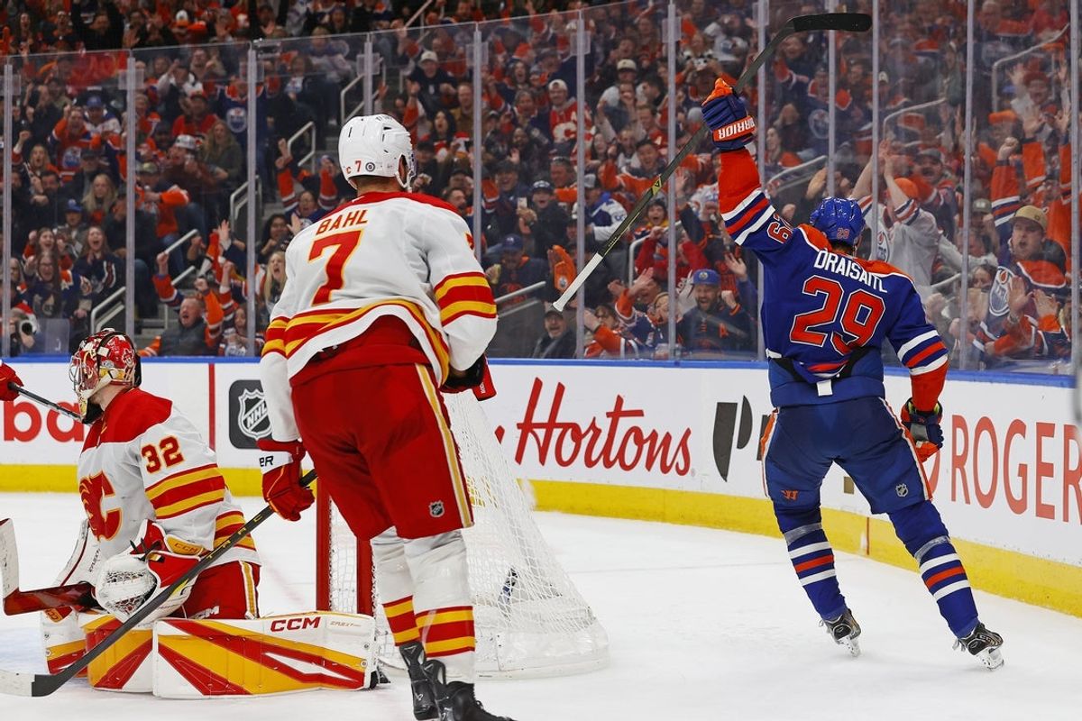 Mar 29, 2025; Edmonton, Alberta, CAN; Edmonton Oilers forward Leon Draisaitl (29) celebrates after scoring his 50th goal of the season during the third period against the Calgary Flames at Rogers Place. Mandatory Credit: Perry Nelson-Imagn Images