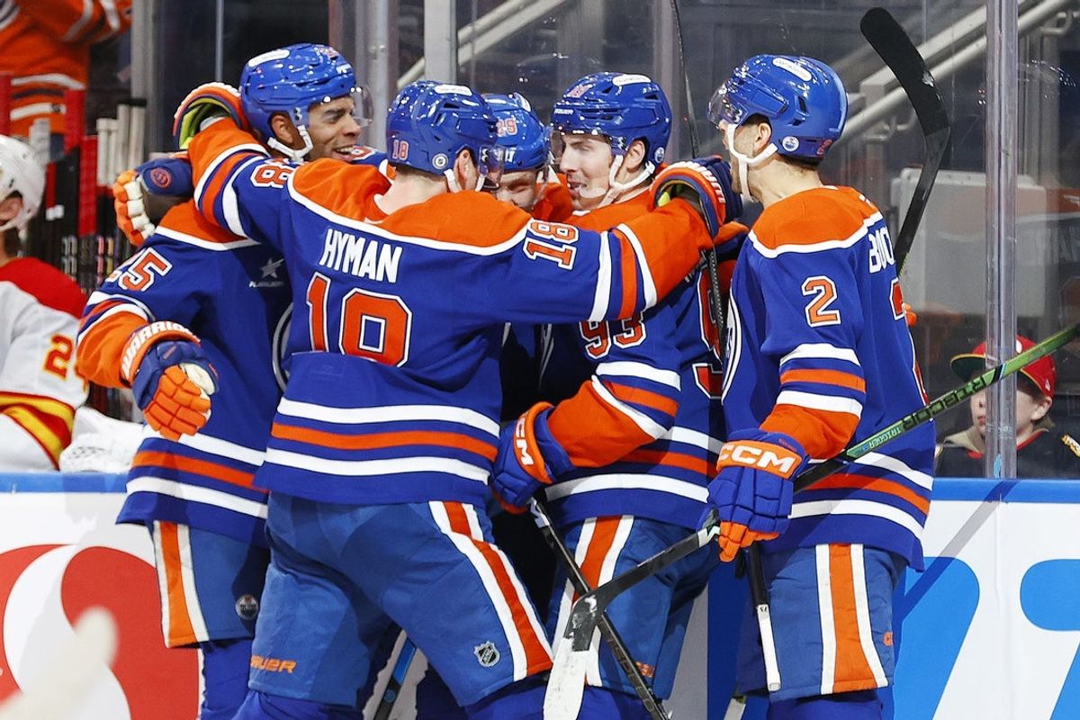 Mar 29, 2025; Edmonton, Alberta, CAN; The Edmonton Oilers celebrate a goal scored by forward Leon Draisaitl (29), his 50th of the season, during the third period against the Calgary Flames at Rogers Place. Mandatory Credit: Perry Nelson-Imagn Images