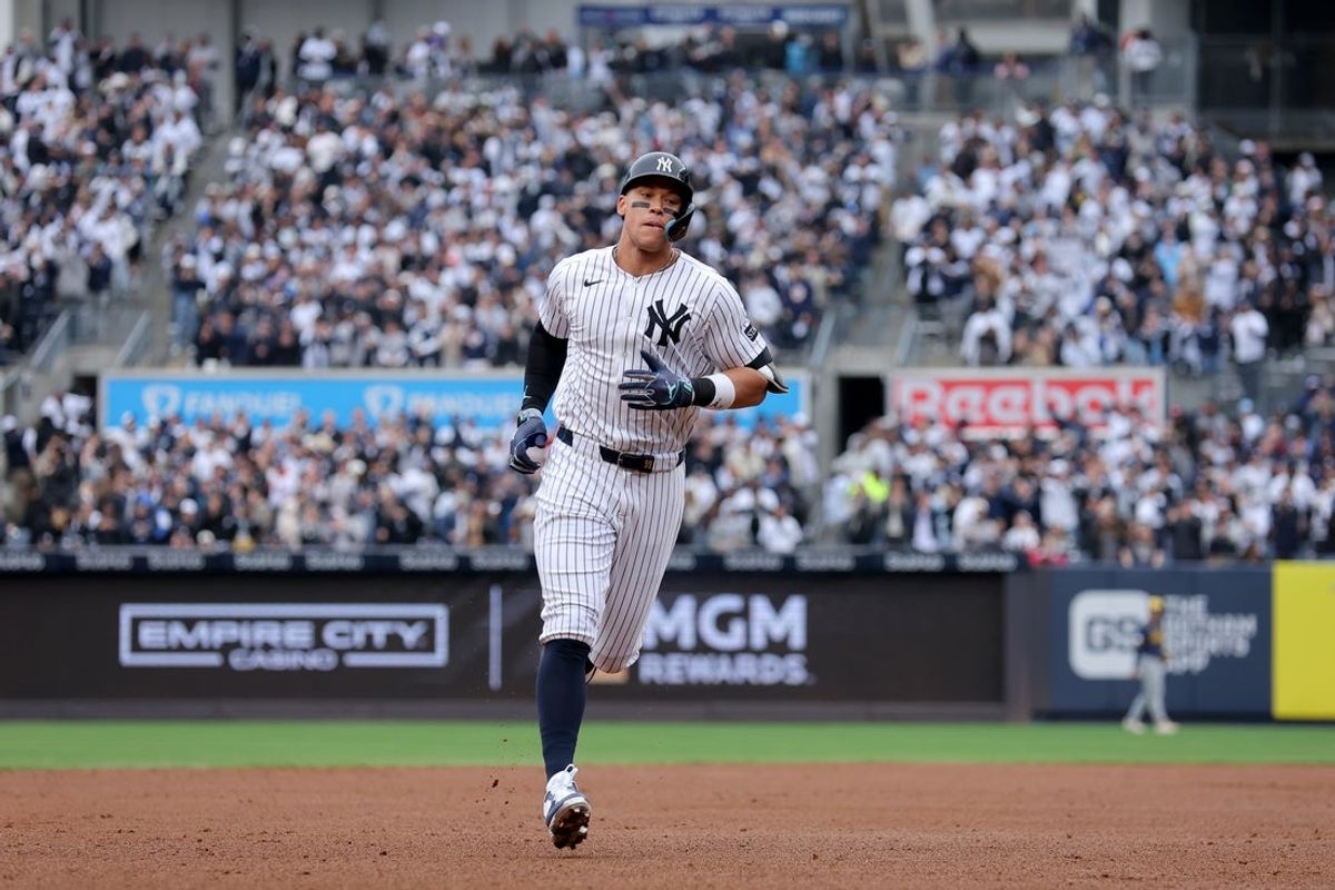 Mar 30, 2025; Bronx, New York, USA; New York Yankees right fielder Aaron Judge (99) rounds the bases after hitting a two run home run against the Milwaukee Brewers during the first inning at Yankee Stadium. Mandatory Credit: Brad Penner-Imagn Images