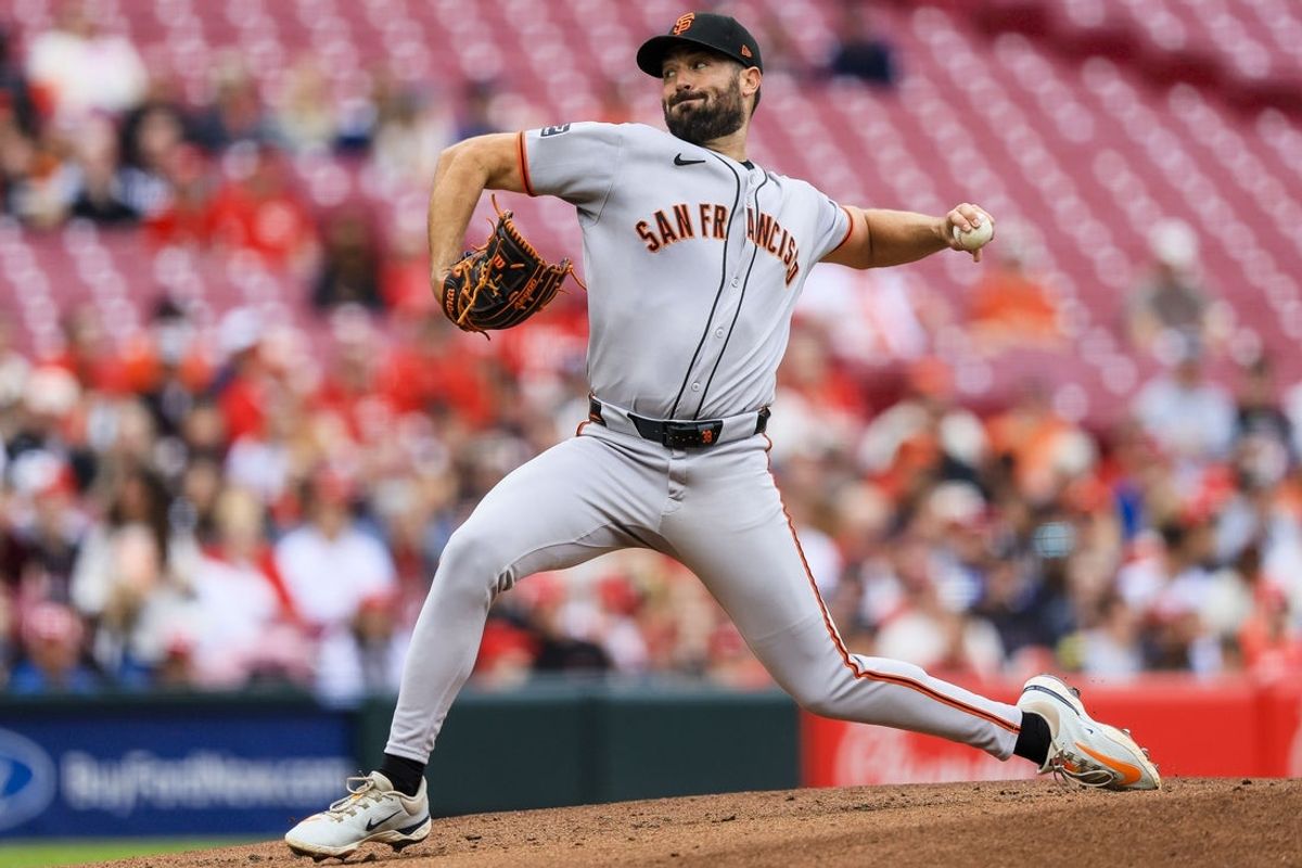 Mar 30, 2025; Cincinnati, Ohio, USA; San Francisco Giants starting pitcher Robbie Ray (38) pitches against the Cincinnati Reds in the first inning at Great American Ball Park. Mandatory Credit: Katie Stratman-Imagn Images