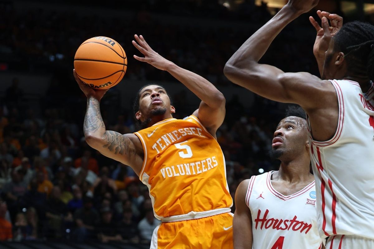 Mar 30, 2025; Indianapolis, IN, USA; Tennessee Volunteers guard Zakai Zeigler (5) shoots the ball over Houston Cougars guard L.J. Cryer (4) in the first half during the Midwest Regional final of the 2025 NCAA tournament at Lucas Oil Stadium. Mandatory Credit: Trevor Ruszkowski-Imagn Images