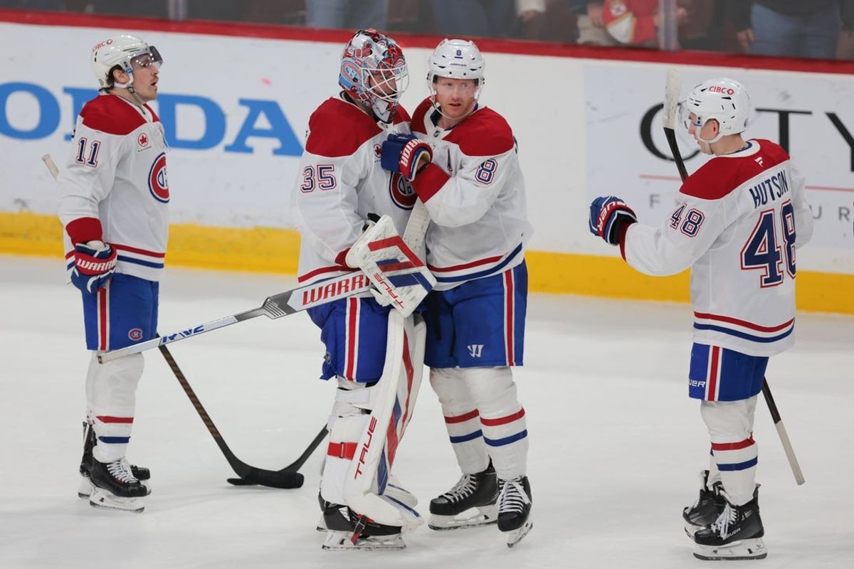 Mar 30, 2025; Sunrise, Florida, USA; Montreal Canadiens goaltender Sam Montembeault (35) celebrates with defenseman Mike Matheson (8) after the game against the Florida Panthers at Amerant Bank Arena. Mandatory Credit: Sam Navarro-Imagn Images