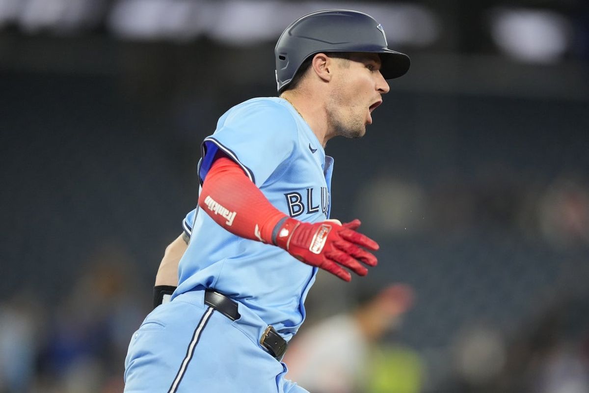 Mar 30, 2025; Toronto, Ontario, CAN; Toronto Blue Jays catcher Tyler Heineman (55) reacts as he runs the bases  after hitting a solo home run against the Baltimore Orioles during the seventh inning at Rogers Centre. Mandatory Credit: John E. Sokolowski-Imagn Images