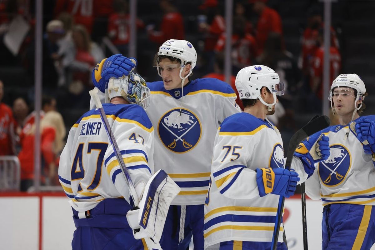 Mar 30, 2025; Washington, District of Columbia, USA; Buffalo Sabres center Tage Thompson (72) celebrates with Sabres goaltender James Reimer (47) after defeating the Washington Capitals at Capital One Arena. Mandatory Credit: Amber Searls-Imagn Images