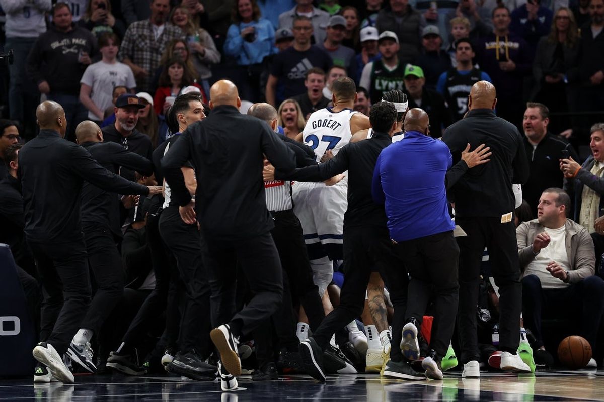 Mar 30, 2025; Minneapolis, Minnesota, USA; Minnesota Timberwolves and Detroit Pistons players get into a fight during the second quarter at Target Center. Mandatory Credit: Matt Krohn-Imagn Images