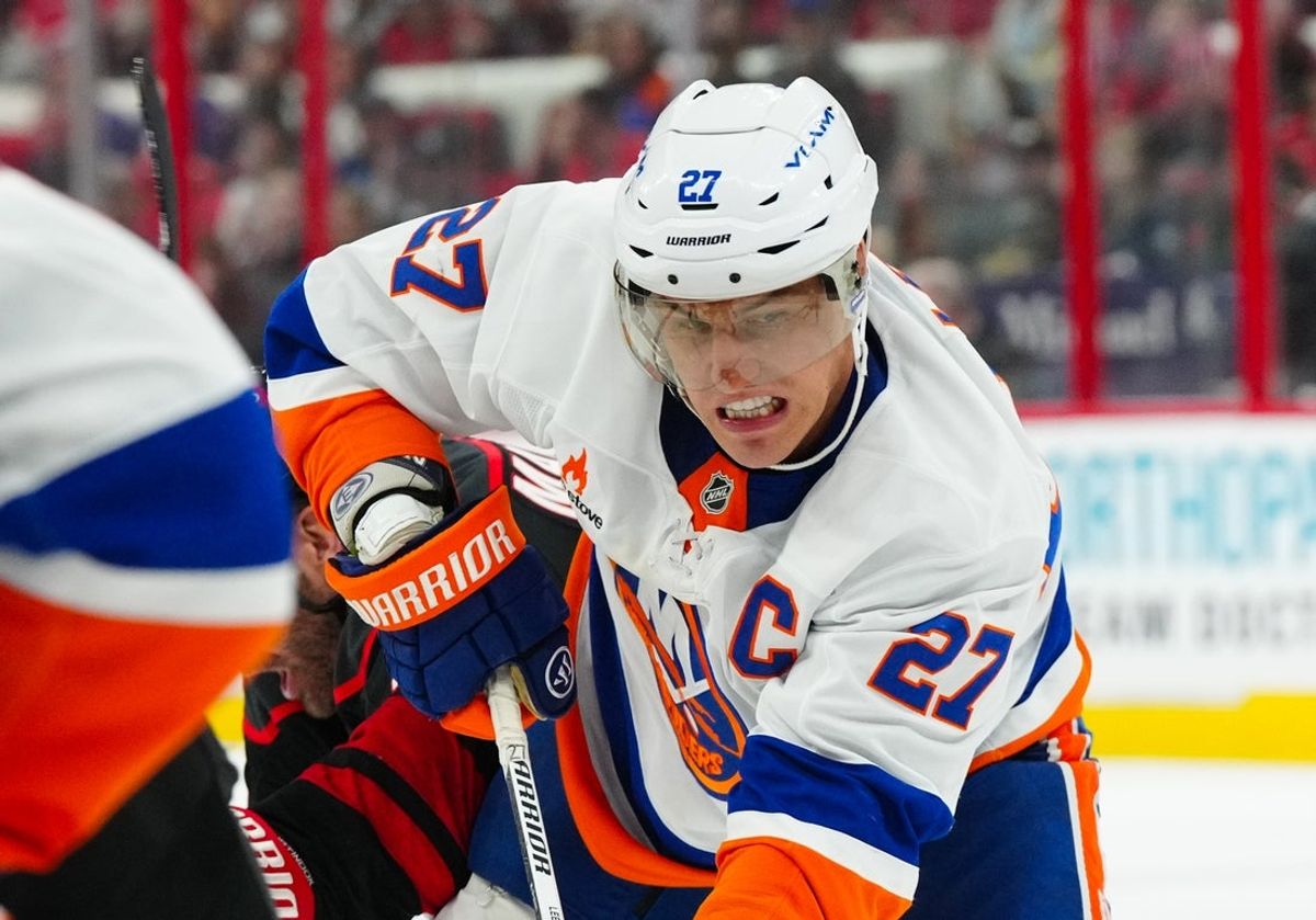 Mar 30, 2025; Raleigh, North Carolina, USA;  New York Islanders left wing Anders Lee (27) watches the play against the Carolina Hurricanes during the third period at Lenovo Center. Mandatory Credit: James Guillory-Imagn Images