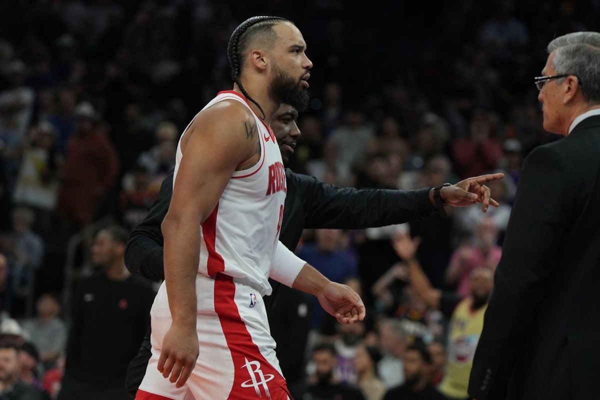 Mar 30, 2025; Phoenix, Arizona, USA; Houston Rockets forward Dillon Brooks (9) leaves the court after being ejected for fighting against the Phoenix Suns in the first half at Footprint Center. Mandatory Credit: Rick Scuteri-Imagn Images