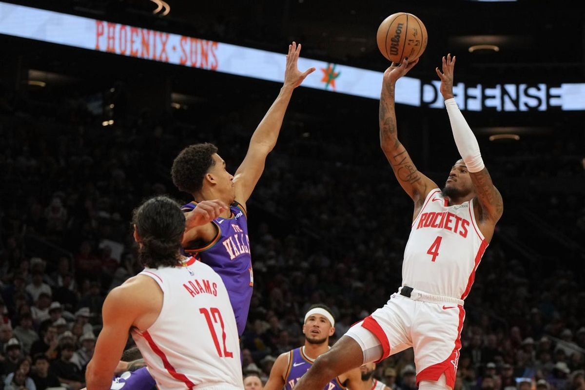 Mar 30, 2025; Phoenix, Arizona, USA; Houston Rockets guard Jalen Green (4) shoots against the Phoenix Suns in the first half at Footprint Center. Mandatory Credit: Rick Scuteri-Imagn Images