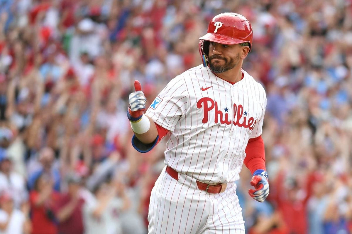 Mar 31, 2025; Philadelphia, Pennsylvania, USA; Philadelphia Phillies designated hitter Kyle Schwarber (12) gives the thumbs up after hitting a two-run home run during the seventh inning against the Colorado Rockies at Citizens Bank Park. Mandatory Credit: Eric Hartline-Imagn Images