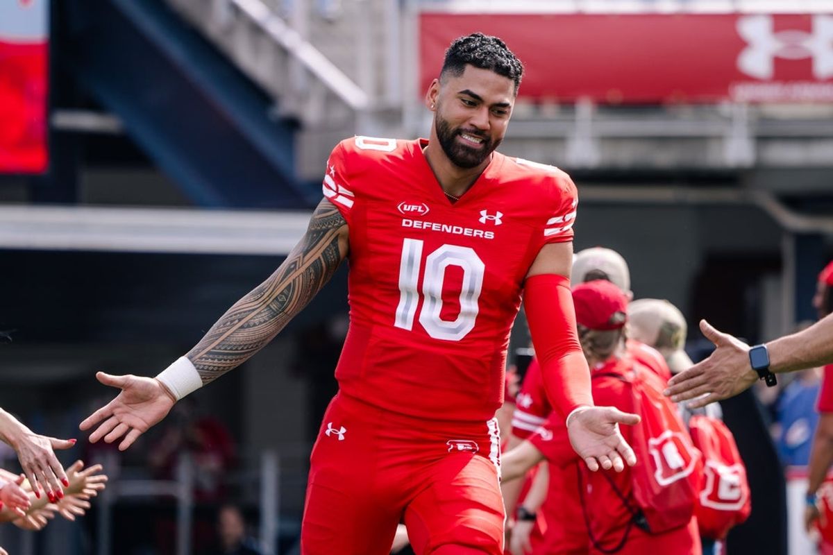 Mar 30, 2025; Washington, D.C., USA; DC Defenders quarterback Jordan Ta'amu (10) runs onto the field pregame against the Birmingham Stallions at Audi Field. Mandatory Credit: Emily Faith Morgan-Imagn Images